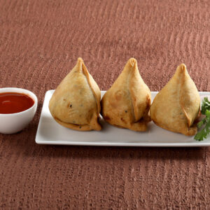 Singara Curry Puff potato and vegetable stuffing deep fried on Color background